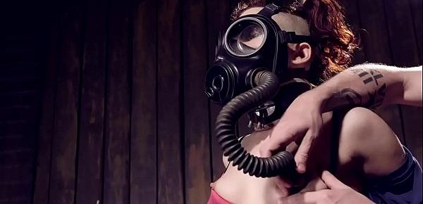  Redhead with gas mask tormented